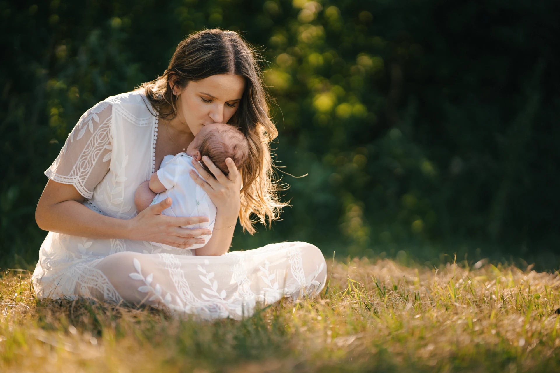 A mother holding her newborn
