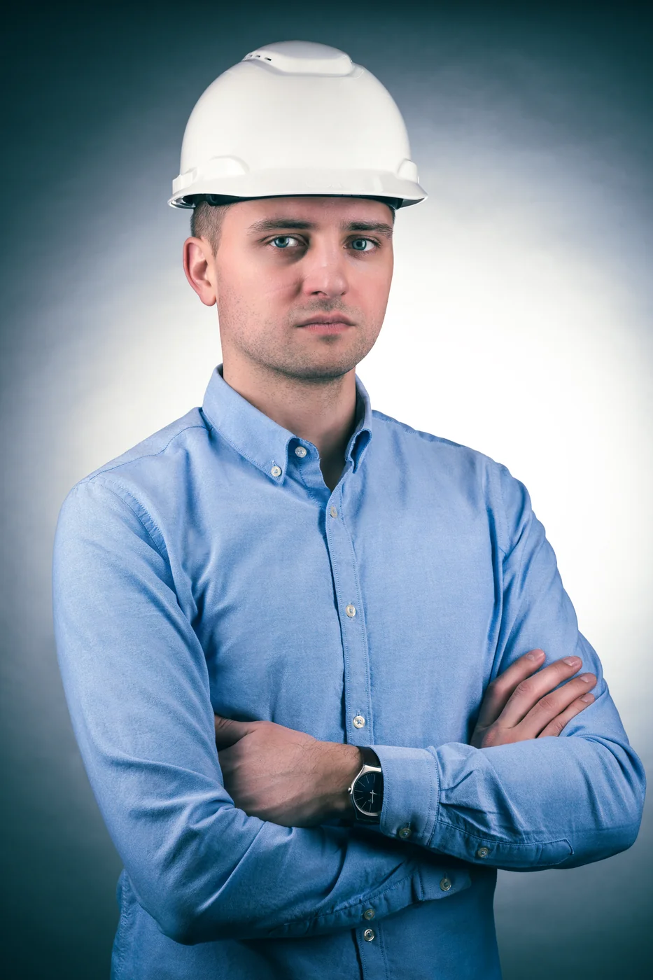Personal branding portrait in a hard hat and work shirt