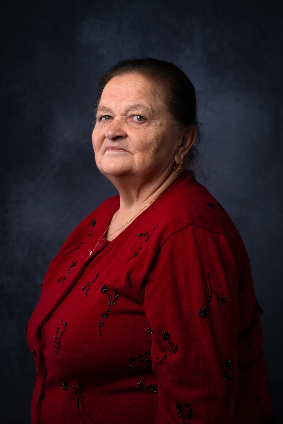 Studio portrait on a dark backdrop
