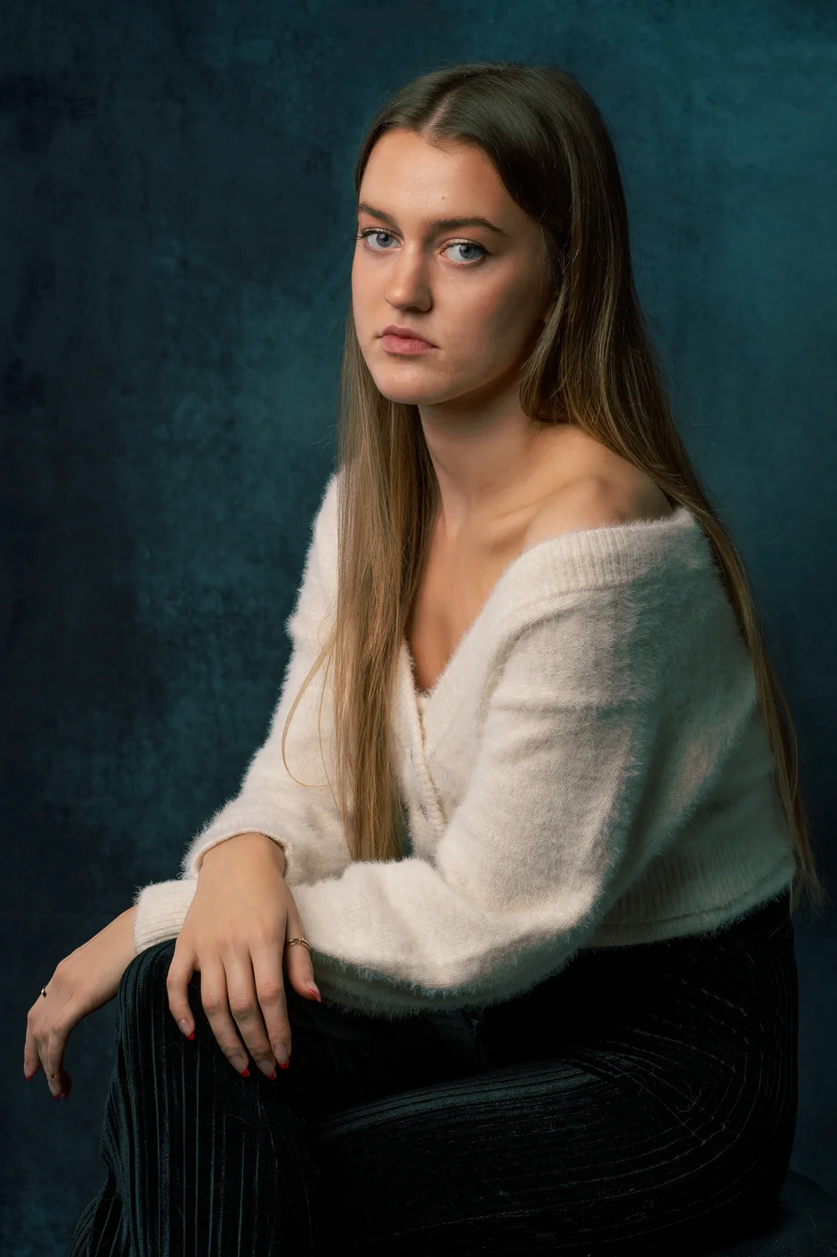 Studio portrait on a dark backdrop