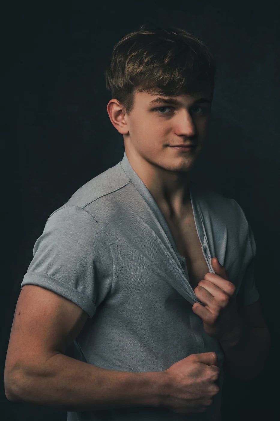 Studio portrait on a dark backdrop